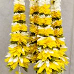 Pair of White Petal Garlands with Green-Yellow Pineapple Cut Bunches