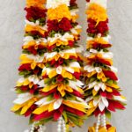 Pair of White Petal Garlands with Green-Mustard-Red Pineapple Cut Bunches
