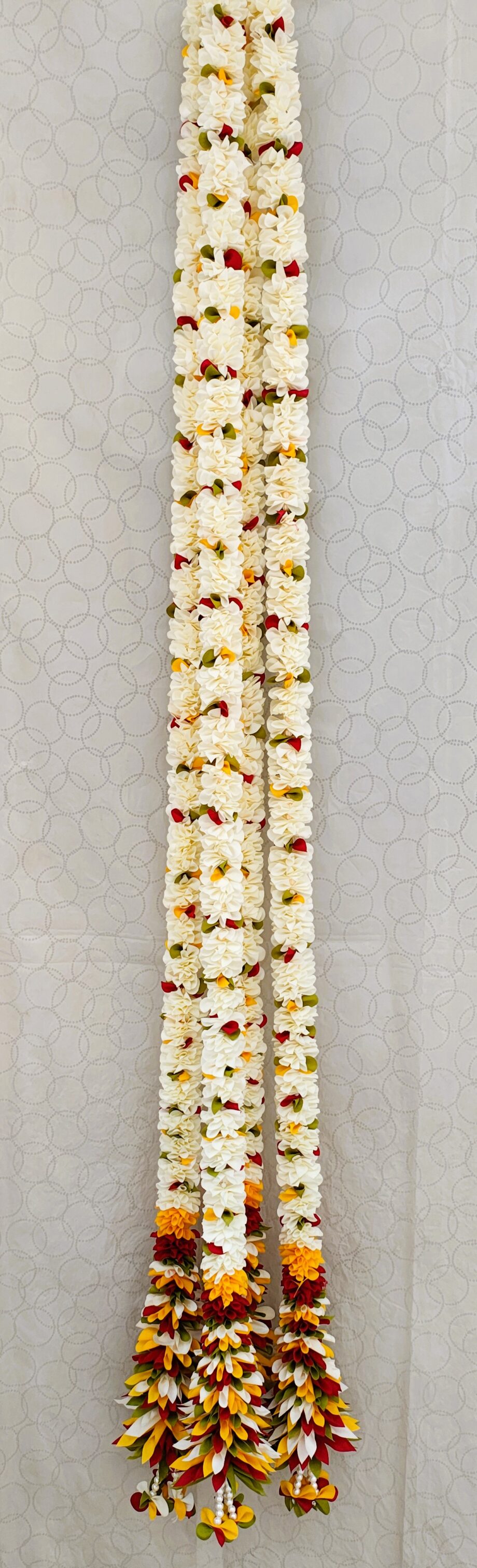 Pair of White Petal Garlands with Green-Mustard-Red Pineapple Cut Bunches