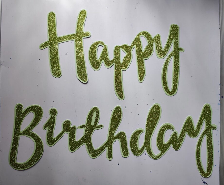 Cursive font Happy Birthday glitter banner - Green